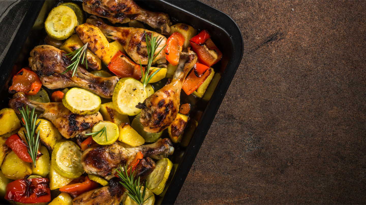 Baked Chicken With Vegetables Preparing In The Oven At Baking Sh